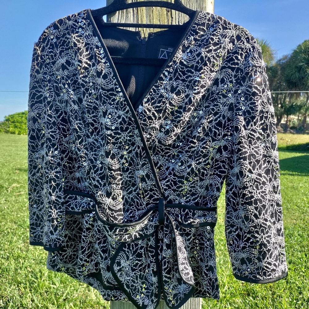 Beautiful seguin blouse for for the holidays.